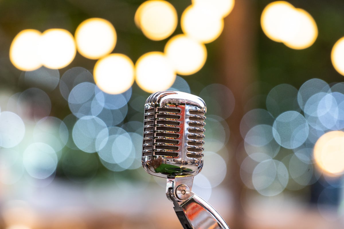 Vintage Microphone on Wall Blurred Background.